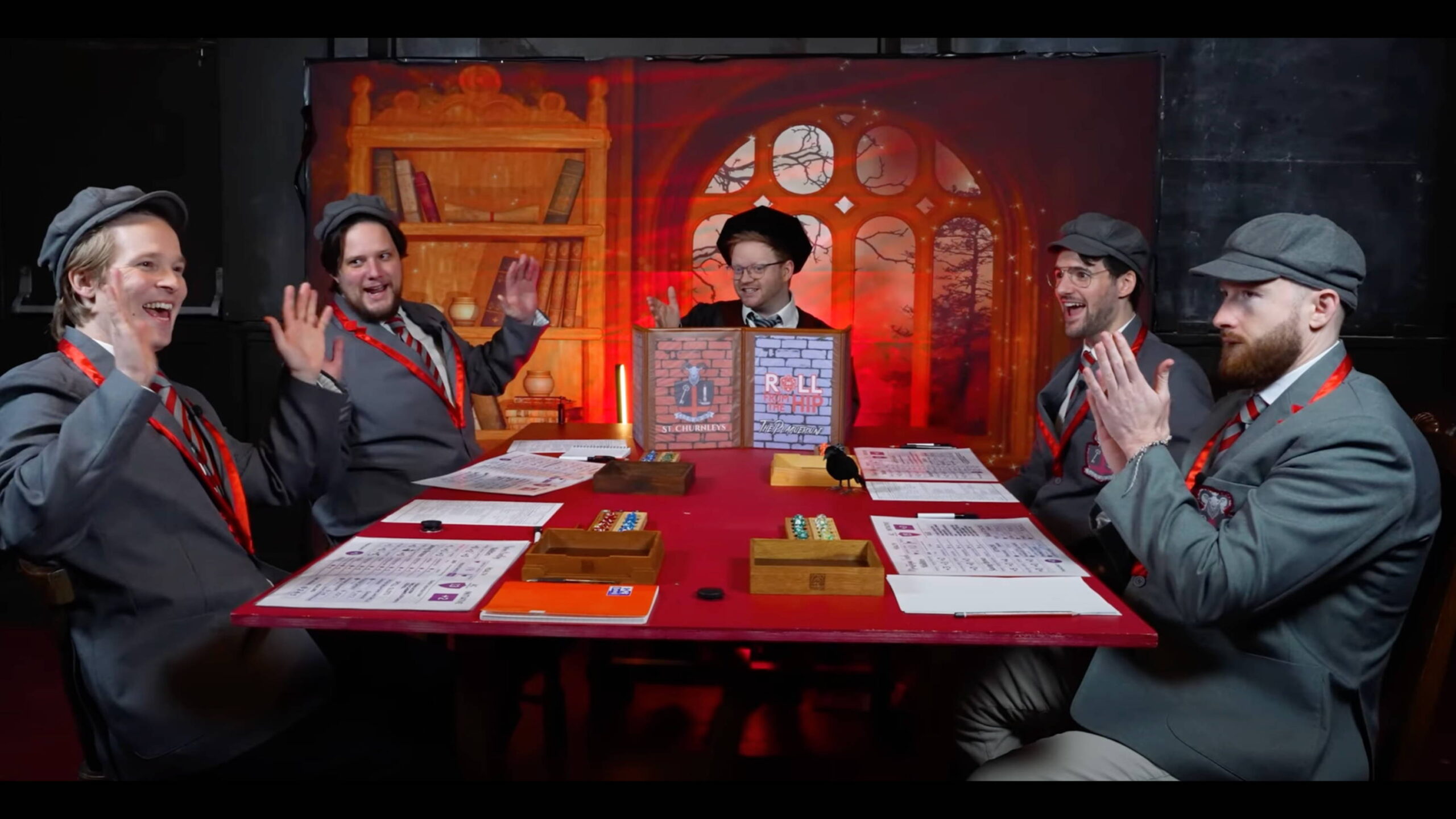 Group shot of the cast of Roll from the Hip at the table, playing their DnD game: Plagueround. Featuring Tabletop Gaming Accessories by Silverwood Gaming, including Dice Trays and Dice Organisers.