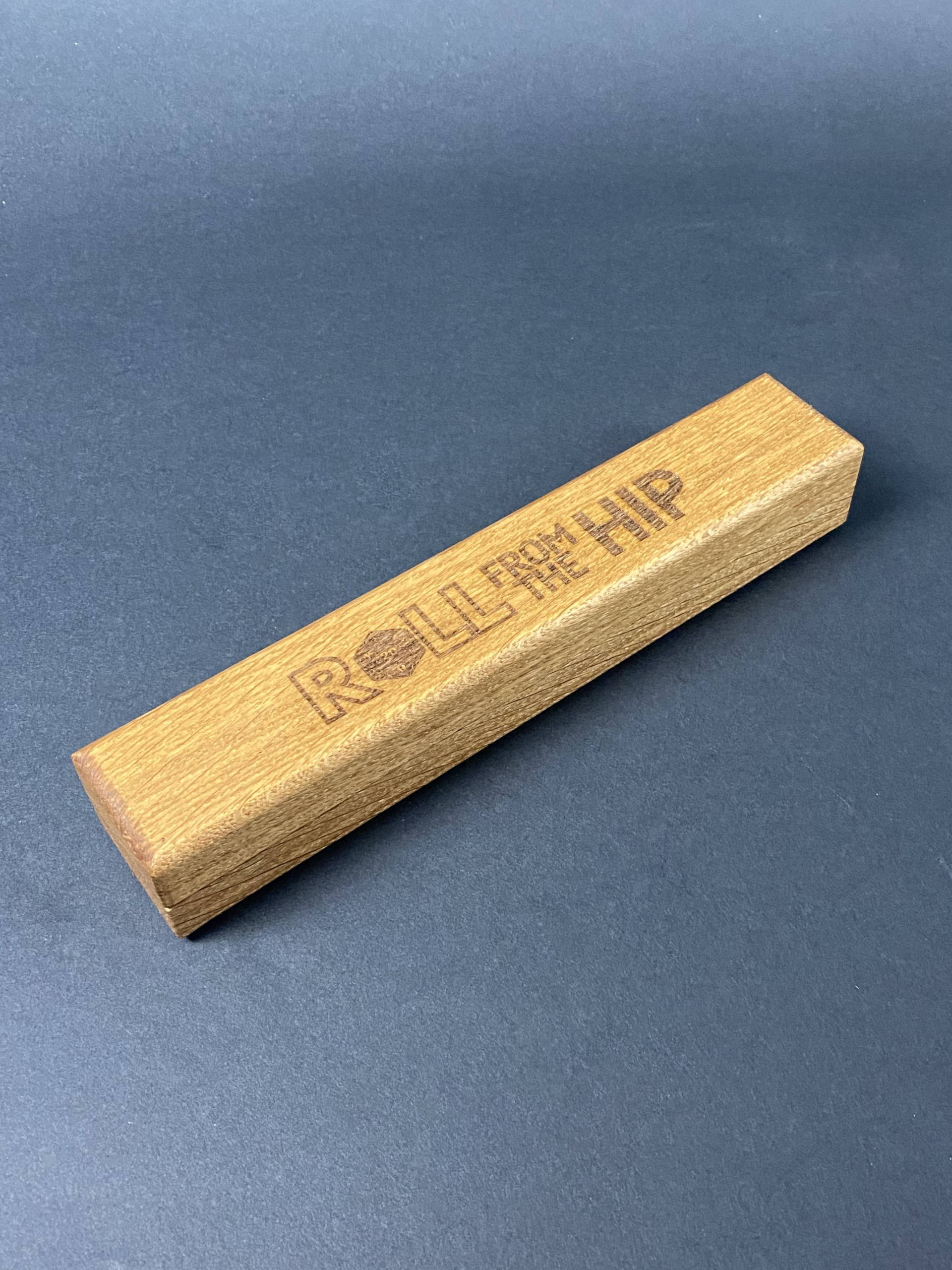 Roll From The Hip Oak Dice Vault.