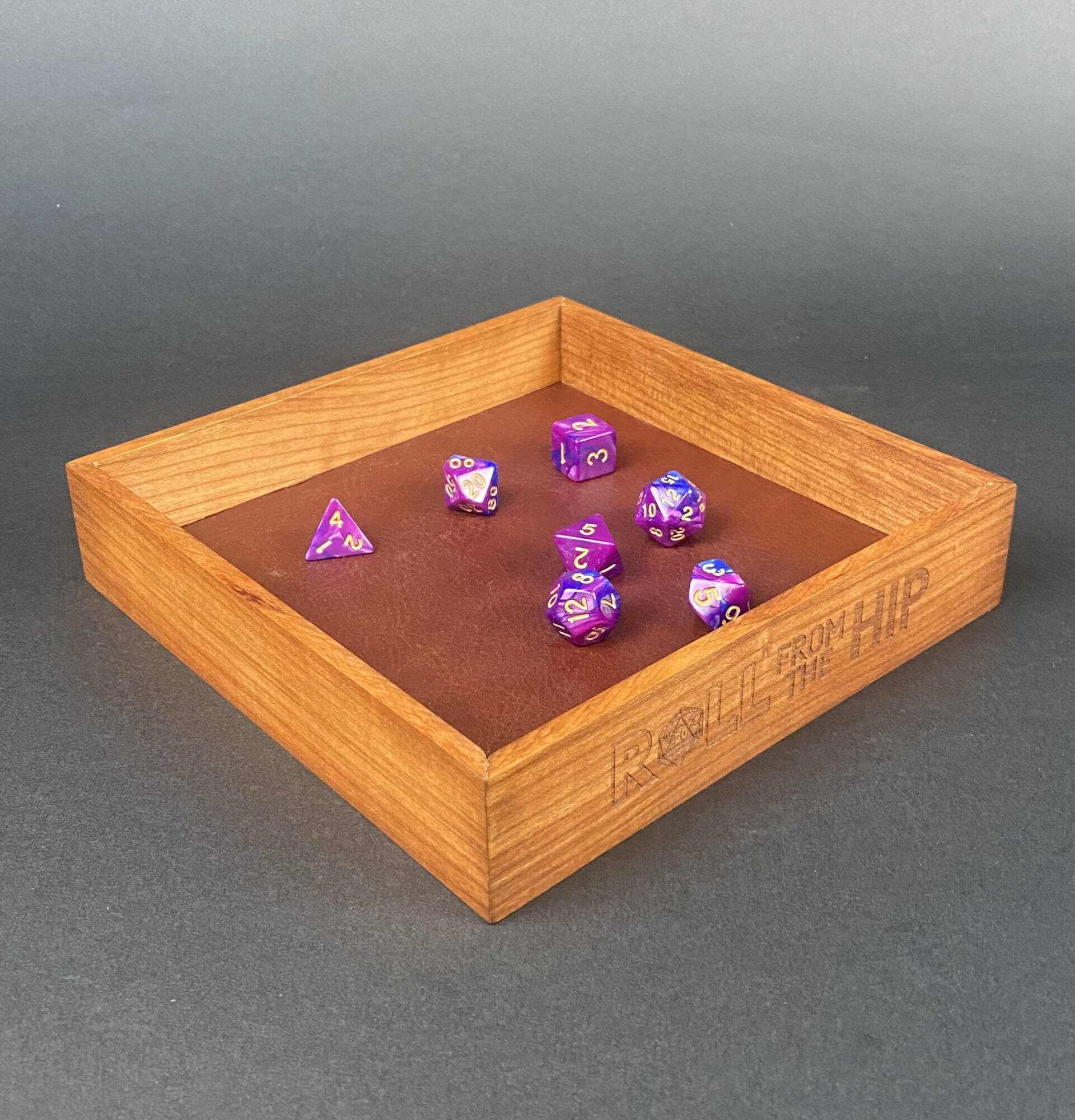 DYCRFTH1 Roll From The Hip branded Cherry Dice Tray (shown with dice) by Silverwood Gaming