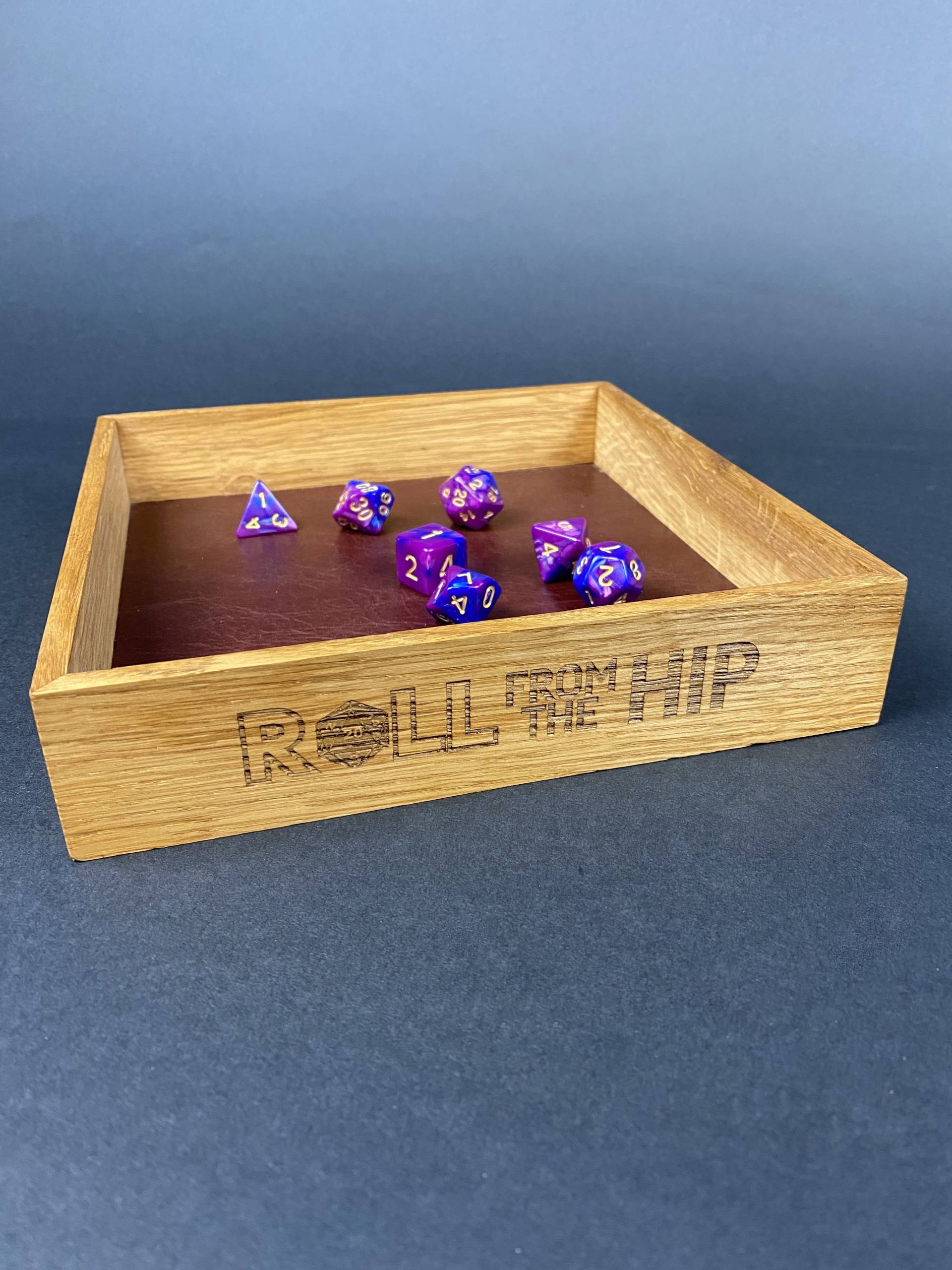 DYORFTH2 Roll From The Hip branded Oak Dice Tray (shown with dice) by Silverwood Gaming. Brand on display more fully